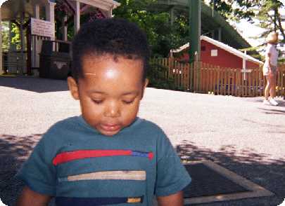 Miles running loosel at Hershey Park (August 1999)